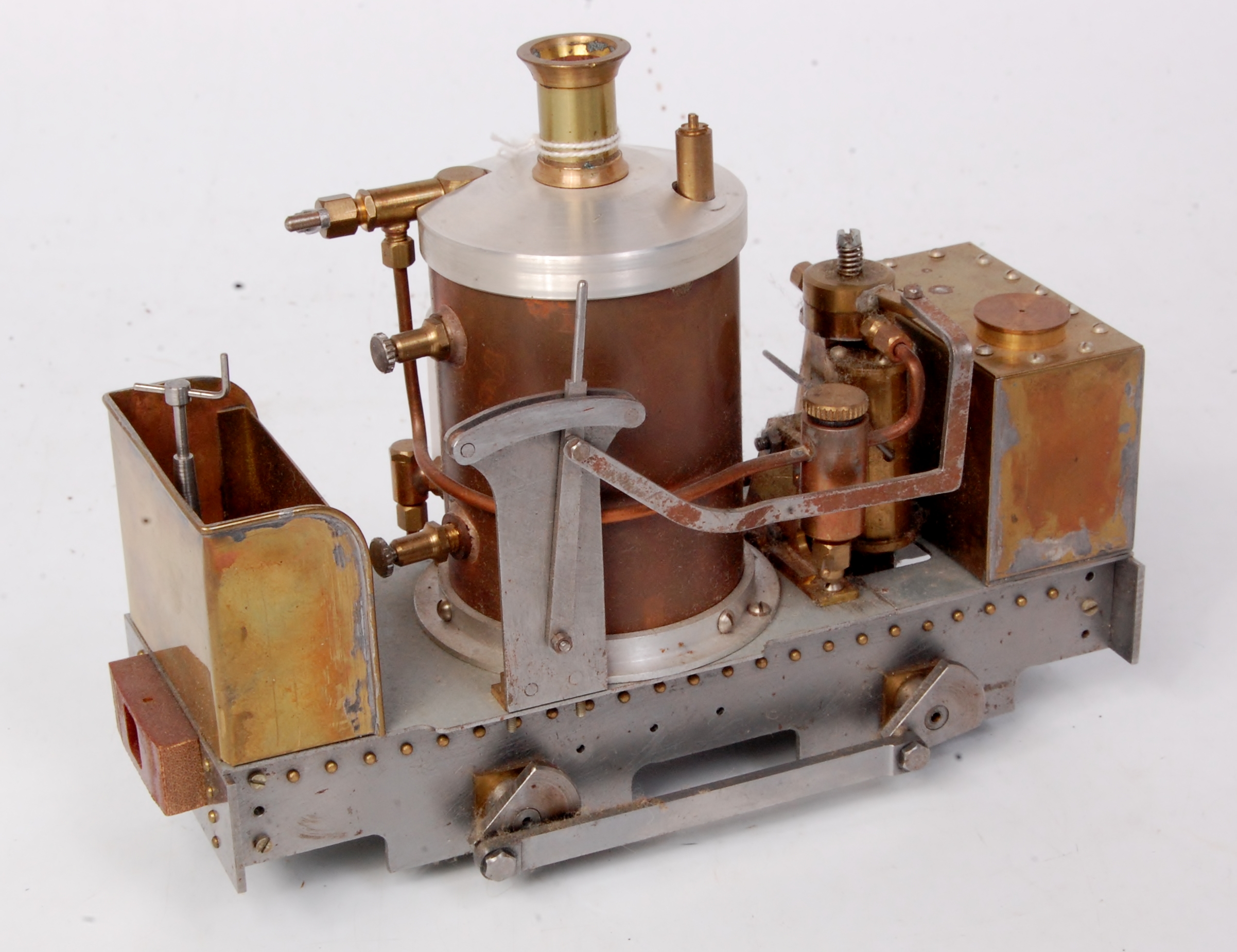 Scratch built 0 gauge narrow gauge 0-4-0 De Winton type locomotive with vertical copper boiler,