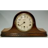 A 1930s oak cased mantel clock,