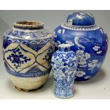 A 20th century Chinese export blue and white vase, decorated with dragons and flowers,