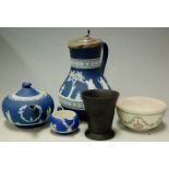 A collection of Wedgwood jasper wares to include; tri-colour bowl, teapot, milk jug etc  Condition