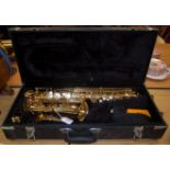 A Jupiter brass saxophone (cased)
