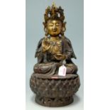 An Chinese bronze and gilt bronze seated deity, 20th century  Condition Report / Extra Information