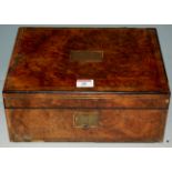 A Victorian burr yew and brass inlaid writing box having a fitted interior and presentation