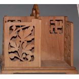 **NEW TO CATALOGUE** A pierced wooden table top book stand