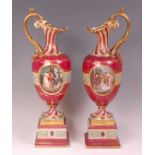 A pair of late 19th century Vienna porcelain pedestal ewers, each of Neo-Classical tapering