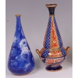 A Doulton Burslem Corolian ware bottle vase, underglaze blue decorated with alternating tones and