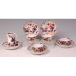 Lowestoft porcelain teawares, comprising; four tea bowls, five stands, and one sparrowbeak cream