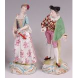 A pair of 19th century Paris porcelain figures of a gallant and his maiden, each in 18th century