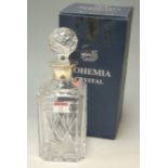 A Bohemia lead crystal glass decanter and stopper with silver collar,