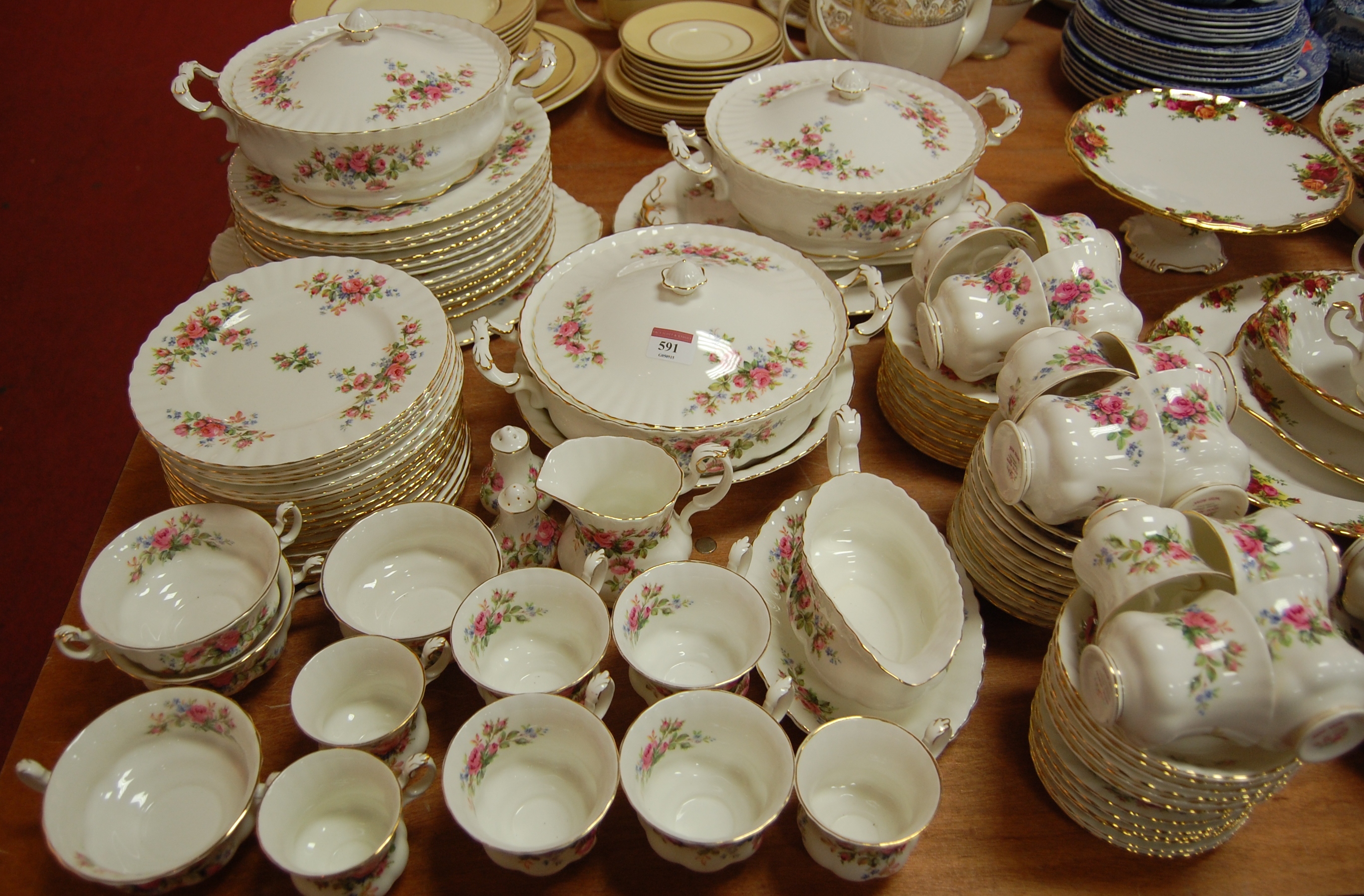 An extensive Royal Albert tea and dinner service in the Moss Rose pattern to include vegetable