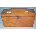 A Victorian mahogany tea caddy of sarcophagus form,