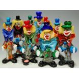 Nine Murano glass clowns