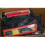 A boxed Triang Hornby haul class locomotive with R760 tender and various loose track etc