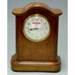 An early 20th century mahogany easel mantel clock, the enamel dial with Arabic numerals,