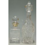 A modern glass decanter and stopper, having a silver collar,