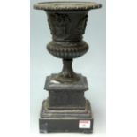 A late 19th century bronze campagna shaped urn, relief decorated with classical figures,