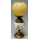 An early 20th century oil lamp,