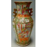 A late 19th century Chinese Canton porcelain famille rose vase of baluster form, typically enamel