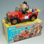 A Japanese tinplate battery operated Honeymoon car,