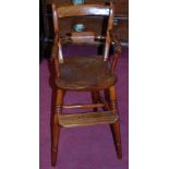 A stained elm seat and beech childs high chair,