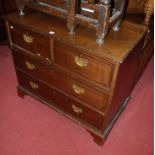 A 19th century oak and mahogany crossbanded square front chest of two short over two long drawers