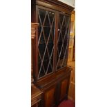 A late 19th century mahogany bookcase cupboard,