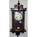 A circa 1900 Vienna walnut cased wall clock of small proportions,