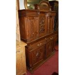 A circa 1900 provincial French carved oak buffet deux corps