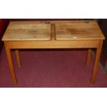 A mid-20th century beech twin childs school desk,