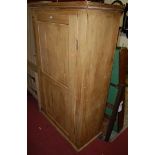 A 19th century pine single door side cupboard, with interior hanging rail  Condition Report /