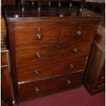 A Victorian mahogany round cornered chest of two short over three long drawers