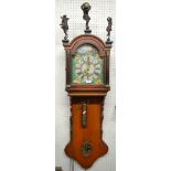 A 19th century Dutch friesian wall clock with alarm,