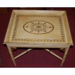 A contemporary cream painted and further gilded tray top occasional table