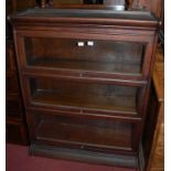 A pair of early 20th century Globe Wernicke style oak three-tier stacking bookcases