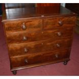 A mid 19th century mahogany and flame mahogany square front chest of two short over three long