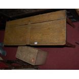 An early 20th century joined oak twin hinge top child's school desk,