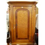 A George IV birdseye maple and mahogany crossbanded single door hanging corner cupboard,