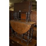 An 18th century joined oak drop leaf dining table,