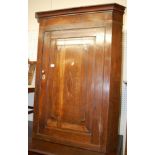 A George III oak and mahogany crossbanded single door hanging corner cupboard