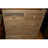 A Victorian pine chest of two short over two long drawers,