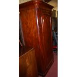 A Victorian mahogany round cornered single door wardrobe,