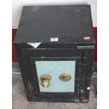 An Edwardian cast iron floor safe of small proportions (lacking key)