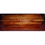 A contemporary Eastern hardwood hinge top blanket box