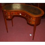 An Edwardian walnut and chequer strung kidney shaped writing table having five drawers Condition