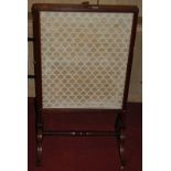 A Regency mahogany and silk inset firescreen,