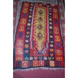 A large Persian woollen Kelim, together with one other smaller example,