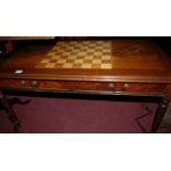 A reproduction mahogany chessboard topped two drawer coffee table;