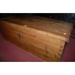 A 19th century pine hinge-top tool chest