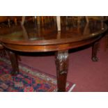 A circa 1900 walnut oval dining table of good size,