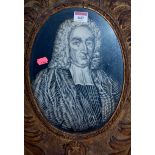 A George III cut paper portrait of a nobleman framed as an oval, 29x21.
